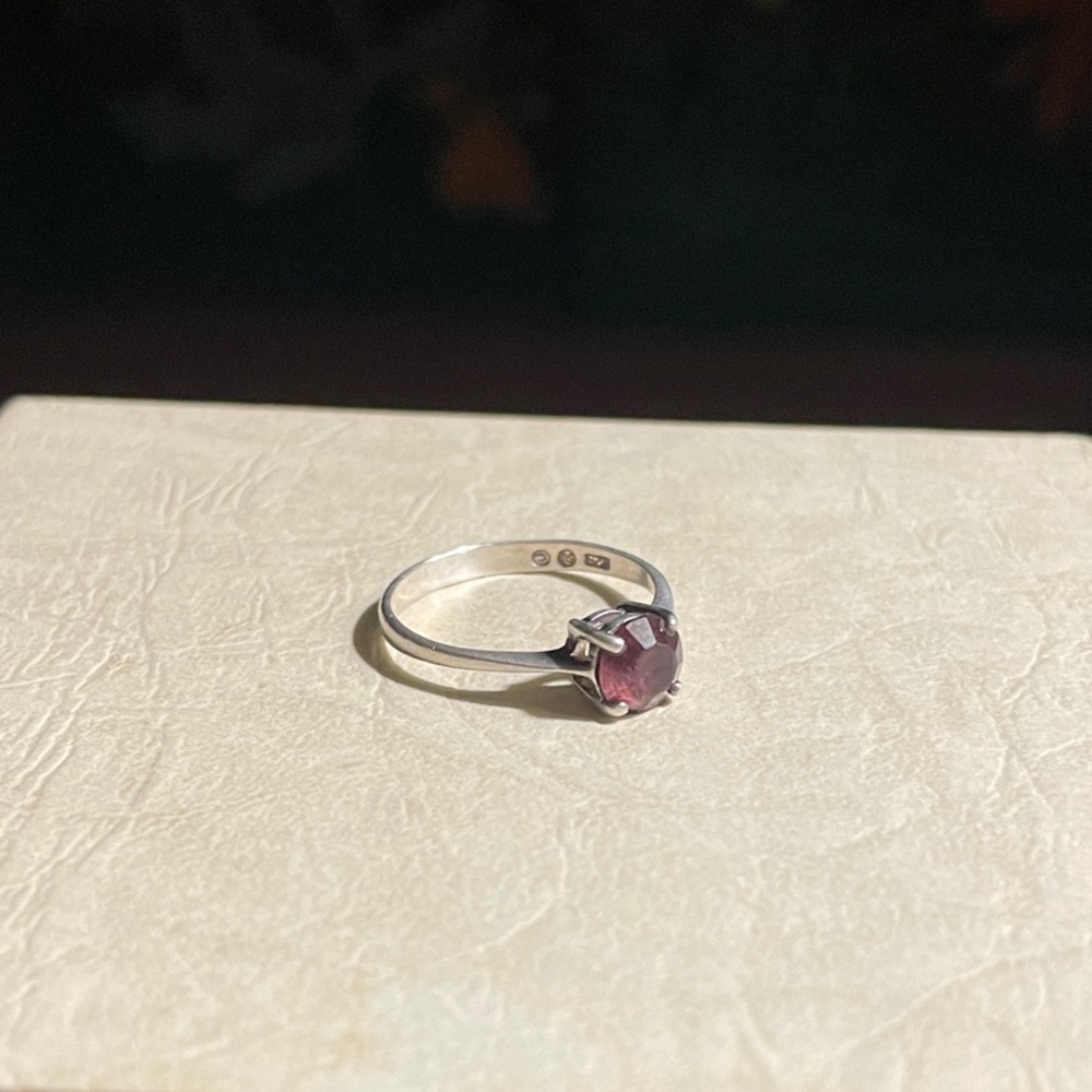 Elegant Silver Ring with Purple Gemstone